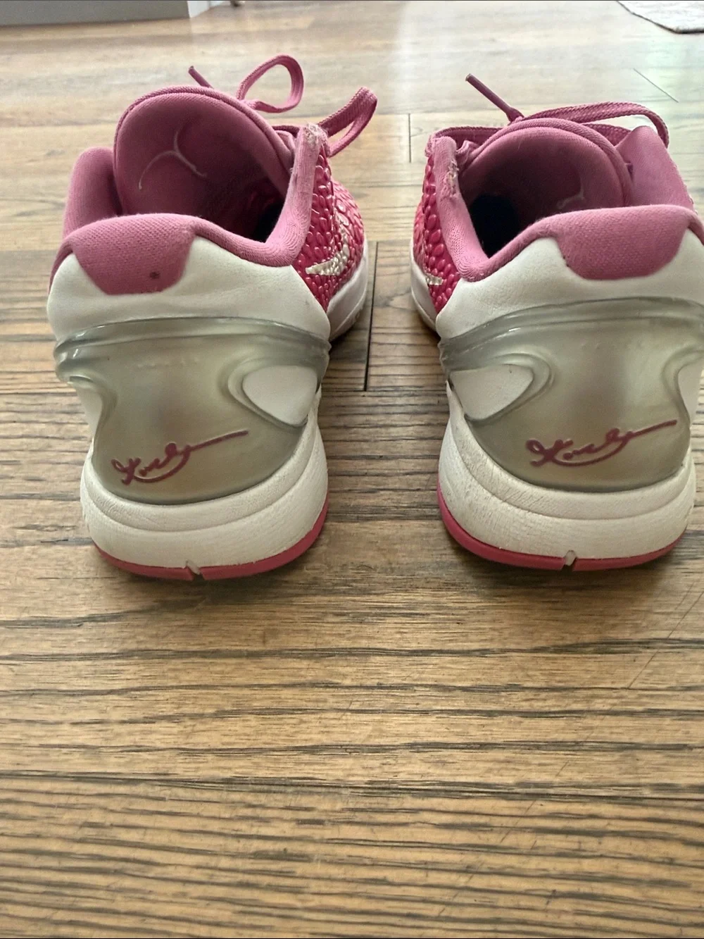 Nike Pink Low-Top Basketball Sneakers with White Swoosh
